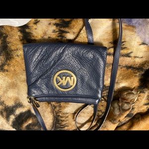 Used MK crossbody bags